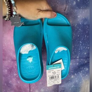 New Reef kids rio slide in the color aqua blue